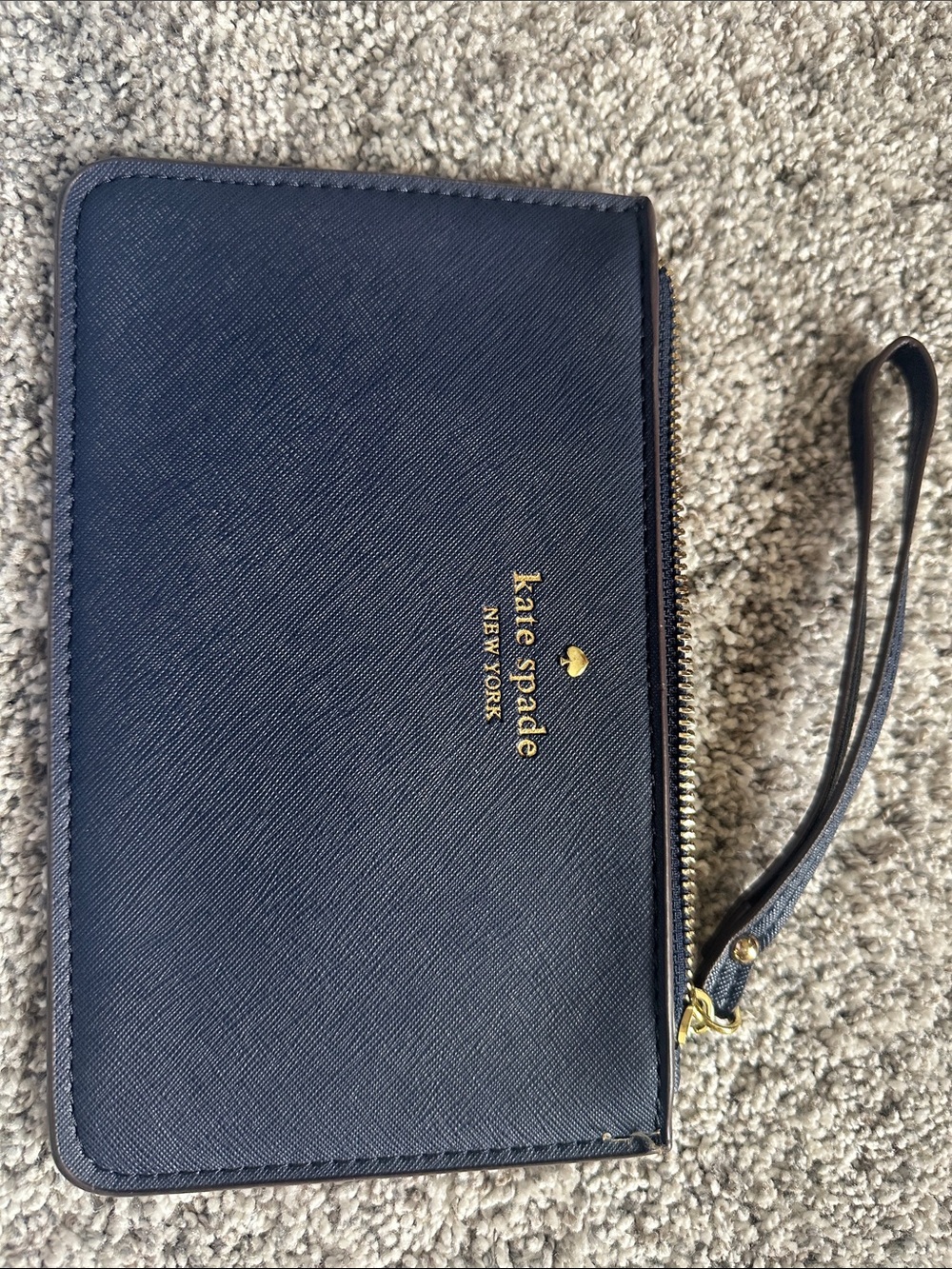 kate spade navy leather zip wristlet with gold logo